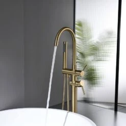 Single-Handle Freestanding Waterfall Tub Filler Bathroom Tub Faucet With Handheld Shower In Brushed Gold -FURITURE SALE SHOP brushed gold claw foot tub faucets q xy hs117 77ng 04 1f 1000