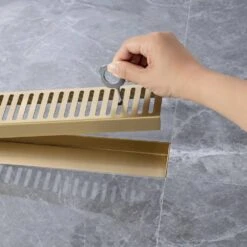 2.75 In. W X 24 In. D Grid Shower Drain Stainless Steel Decorative Drain Cover With Brushed Gold 16 2.75 In. W X 24 In. D Grid Shower Drain Stainless Steel Decorative Drain Cover With Brushed Gold -FURITURE SALE SHOP brushed gold tahanbath shower drains q pzz 7002lsj 24 1f 1000